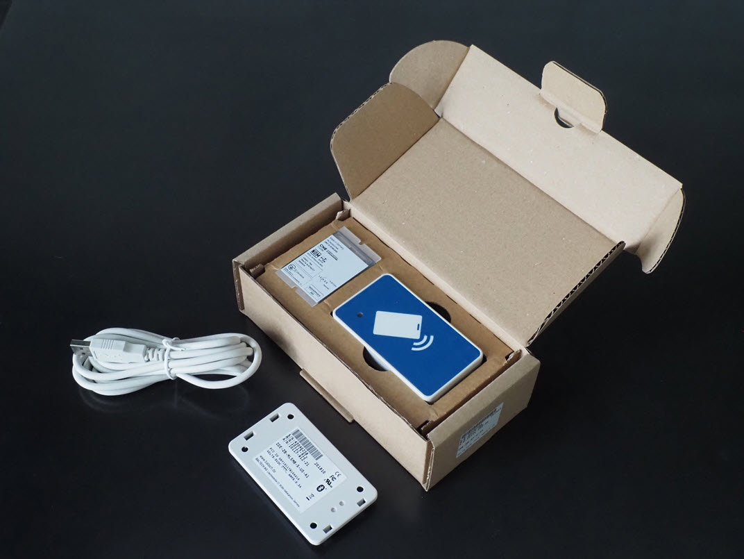 Micro Card Reader für Print Management, früher exklusiv von Kofax vertrieben, jetzt im BALTECH-Direktvertrieb: Lesemodul, Gehäuse, USB-Kabel, Verpackung